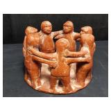 Terracotta circle of friends, 7 1/4" h. x 10"