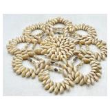 Vintage cowrie shell trivet, 10" diam.