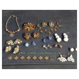 Group of costume jewelry: Necklaces, earrings,