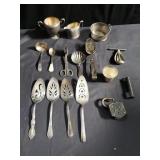 Group of locks and silverplated pieces flatware,