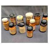 Antique brown apothecary bottles from an old