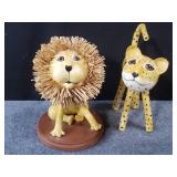 Pair of composite hand painted animal sculptures