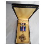 Flying cross medal. display case.