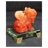Asian composite Foo dog on glass base, 4" l. x 3