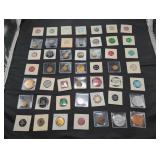 Collection of vintage tokens and medals in holders