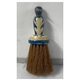 Carved wood penguin cloth brush