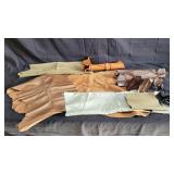 Group of vintage leather pieces, container