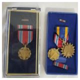 3 military medals. display case.