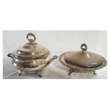 Two ornate white metal serving bowls with pyrex