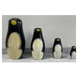 Wood penguin nesting dolls