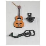 Three bottle openers , two iron,  obe wood