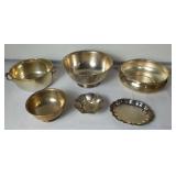 Group of metal serving dishes