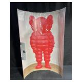KAWS exhibition poster with Red Michelin style man