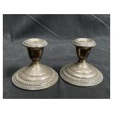 Pair of empire weighted sterling candle holders
