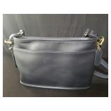 Designer style purse labeled Coach
