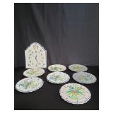 Box of pottery plates and clock made in Italy