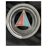 Vintage Plymouth valiant grill ornament.