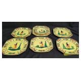 Group of handpainted pottery plates