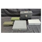 Group of vintage metal cash and file boxes, some