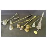 Group of 8 metal candle snuffers