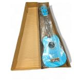 Blue ukulele in original box- new