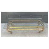Vintage gilt glass coffee table with metal base