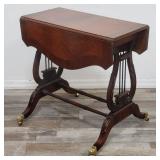 Vintage mahogany drop leaf lyre table