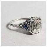 18KT gold ring with diamond and blue stones