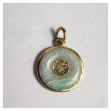 14k gold and green stone pendant
