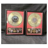 A pair of framed Kiss, and Whitesnake record CD