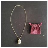 14kt gold chain with 14kt diamond turtle pendant