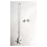 18KT gold and diamond earrings, necklace, and