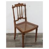 Vintage carved wood cane seat side chair