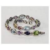 14 Kt white gold bra elet w/multi colored s