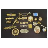 Group of pins, pendants, and brooches