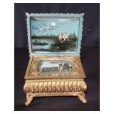 Handpainted brass music box