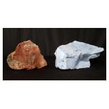 Box of rock specimen and white and blue glass