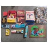 Box of vintage and antique board games.