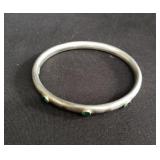 Sterling silver bracelet with green glass stones