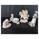 Group of porcelain figurines one composite in b