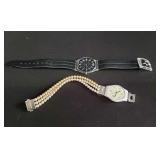 Pair of Swatch wristwatches