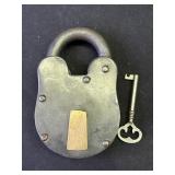 Antique cast iron padlock with key