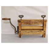 Antique clothes wringer by Anchor Brand