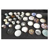 Group of assorted porcelain cups and saucers