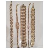 Group of Gold tone bracelets ,some with clear