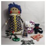 Group of toys, Hello Kitty, Obama dashboard doll