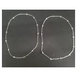 Pair of sterling silver necklaces with