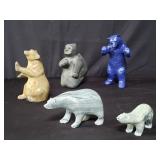 Group of stone, composit & metal polar bears,