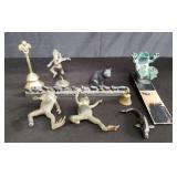 Group of brass figurines and bells