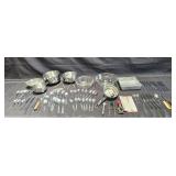 Large group of serving and kitchen items with